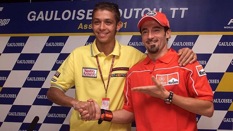 Marc Marquez dan Valentino Rossi. Copyright: Â© INDOSPORT
